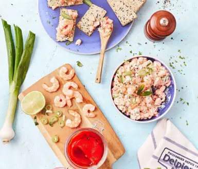 “Dip” de crevettes à base d’oignons, poivrons piquillos, d’ail, fromage à tartiner et coriandre.